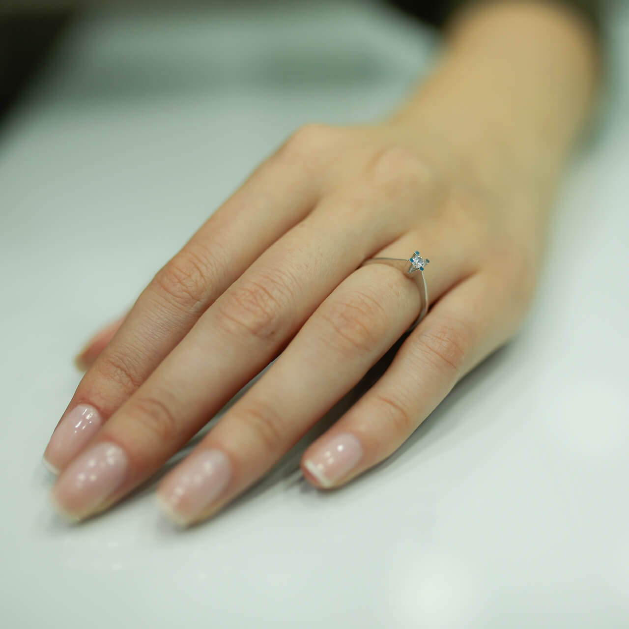 0.12 Carat Diamond Solitaire Ring