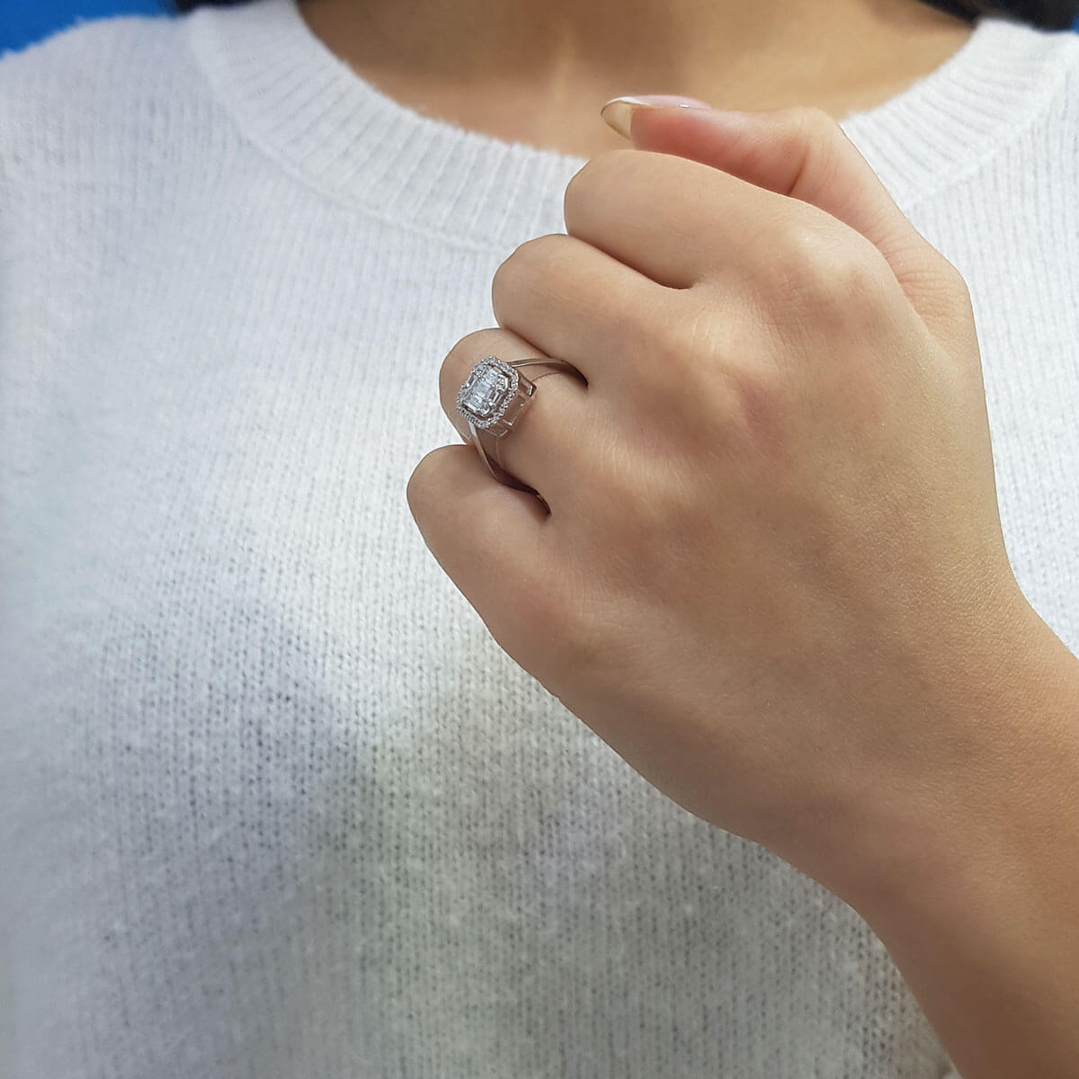 0.61 Carat Baguette and Four-Corner Diamond Ring