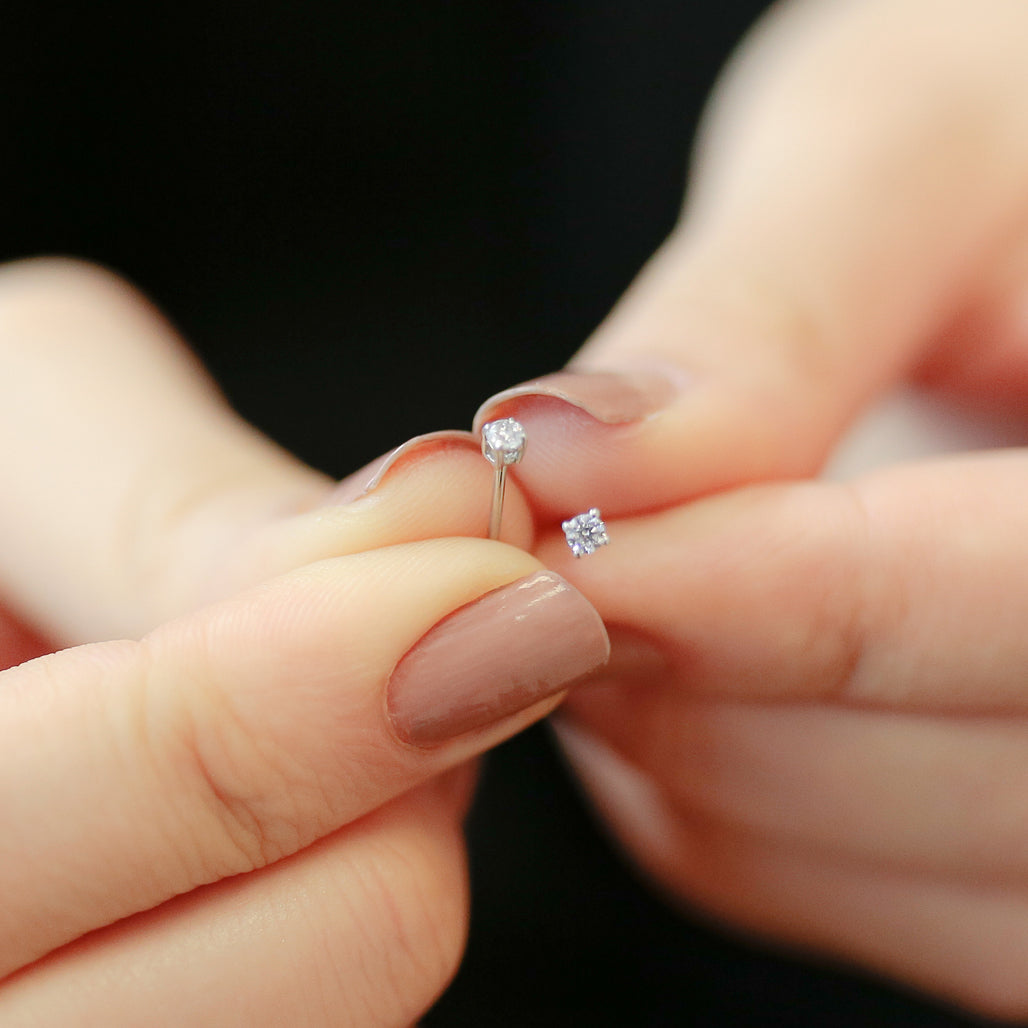 0.12 Carat Diamond Solitaire Earrings