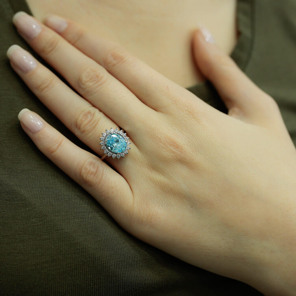 Oval Blue Topaz Entourage Ring with Diamonds