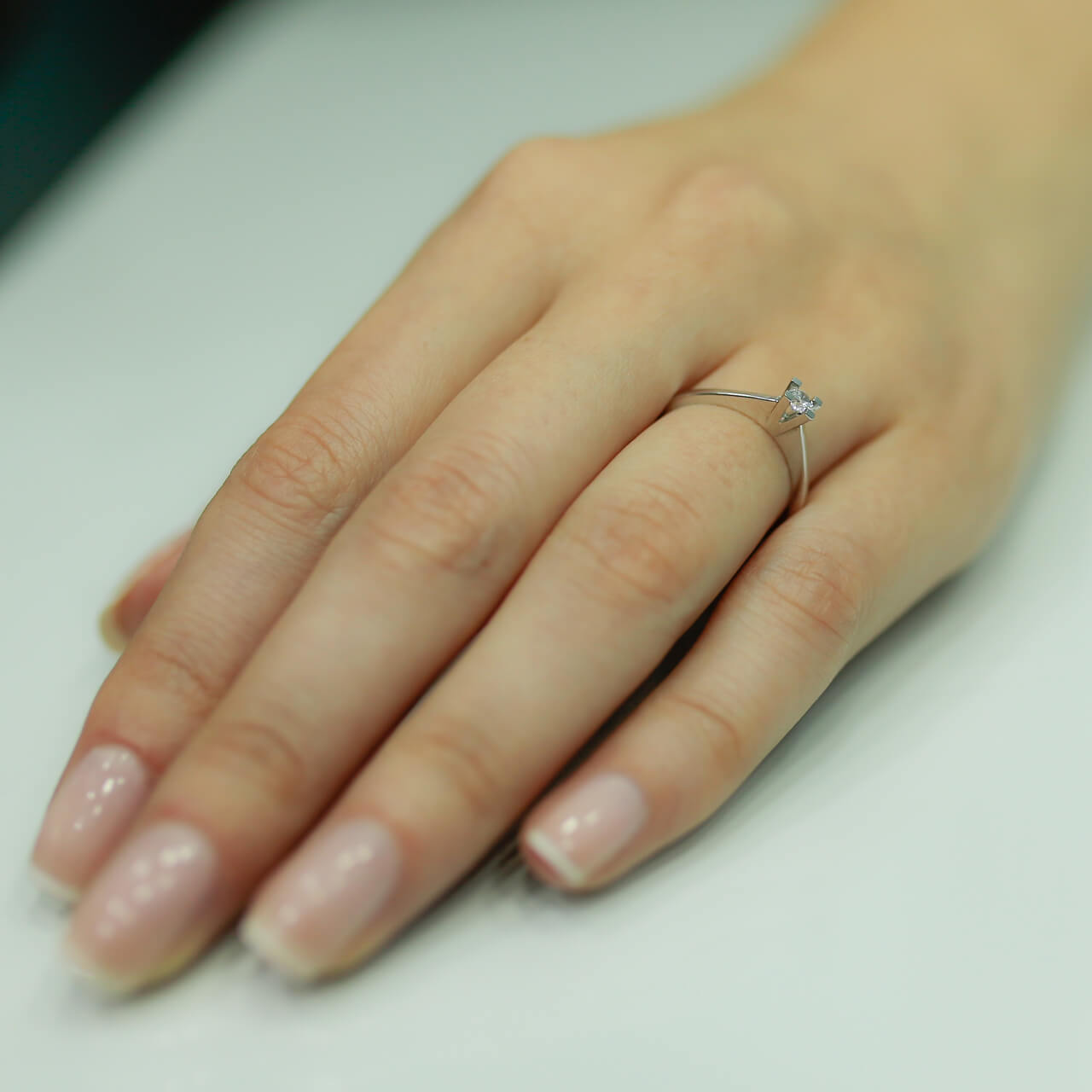 0.12 Carat Diamond Solitaire Ring