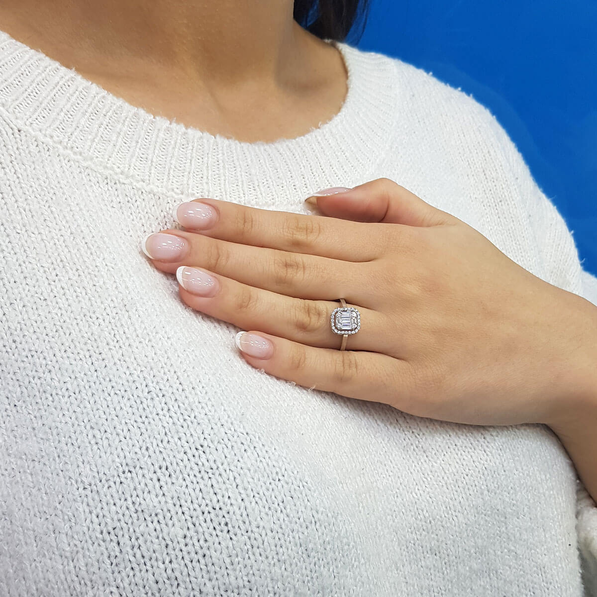 0.61 Carat Baguette and Four-Corner Diamond Ring