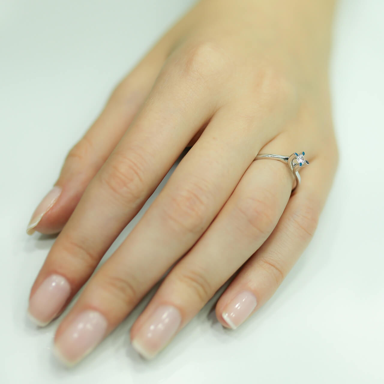 0.12 Carat Diamond Solitaire Ring